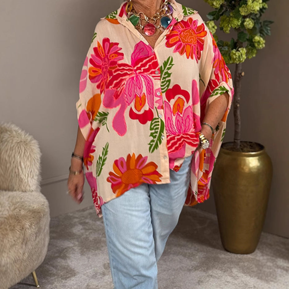 Damen nan luftige Oversize-Hemdbluse im Resortstil mit großflächigem Blumenprint und asymmetrischem Zipfelsaum Echo Archiv