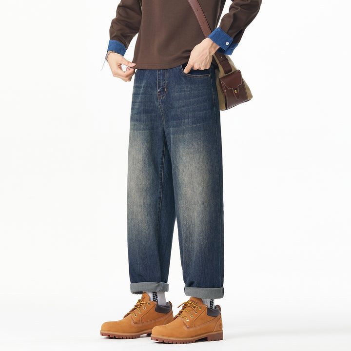 Herren Weite gerade geschnittene Denim-Jeans mit Used‑Wash und Umschlagbund Echoarchiv