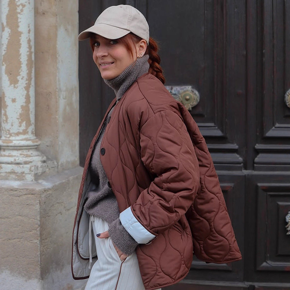 Damen gesteppte Übergangsjacke mit runder Steppung, Boxy‑Silhouette und Druckknopfleiste Echoarchiv
