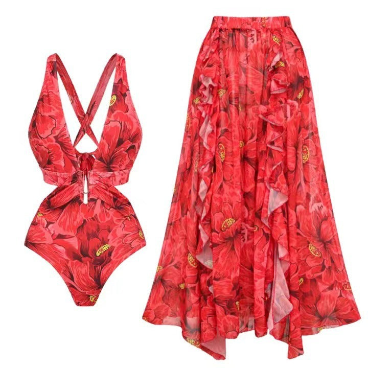 Damen Badeanzug mit floralen Akzenten und passendem Wickelrock Echo Archiv