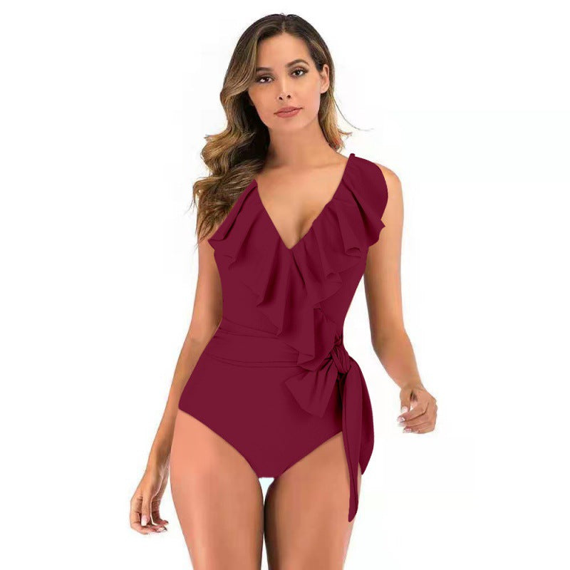 Damen Einteiliger Badeanzug mit raffinierten Rüschendetails und eleganter Schleife Echo Archiv
