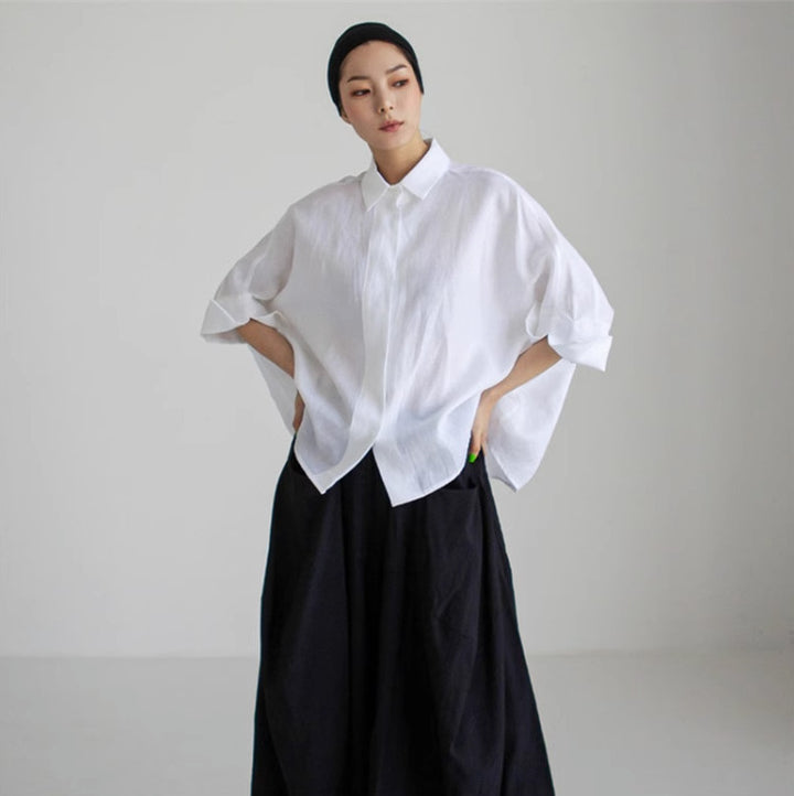 Damen Weite Boxy-Leinenbluse mit verdeckter Knopfleiste, Stehkragen und krempelbaren Ärmeln – Élovi