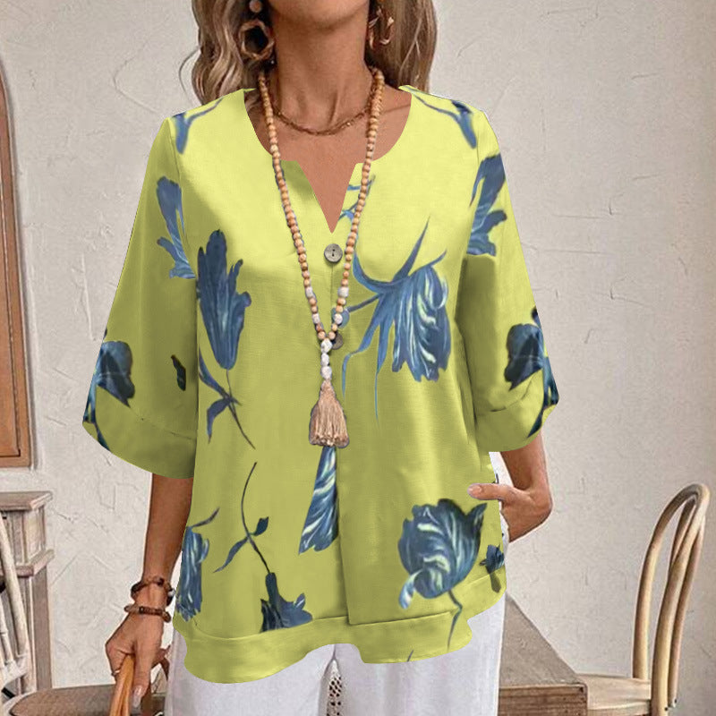 Damen Freizeit Tunika Bluse mit V-Ausschnitt, Schlitzknopf, Dreiviertelärmeln und floralem Oversize-Druck – Élovi