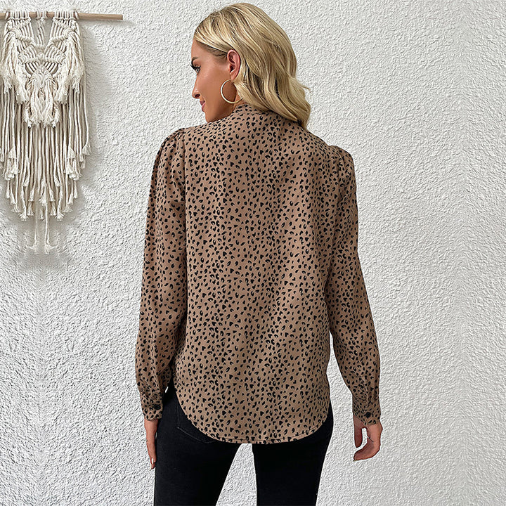 Damen Schluppenbluse aus leichtem Viskose‑Mix mit Bindekragen, Manschettenärmeln und Animal‑Print Echoarchiv