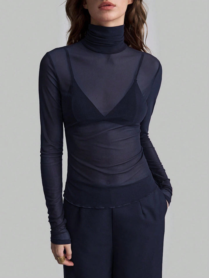 Damen Transparente Turtleneck-Bluse mit figurformendem Schnitt Echoarchiv
