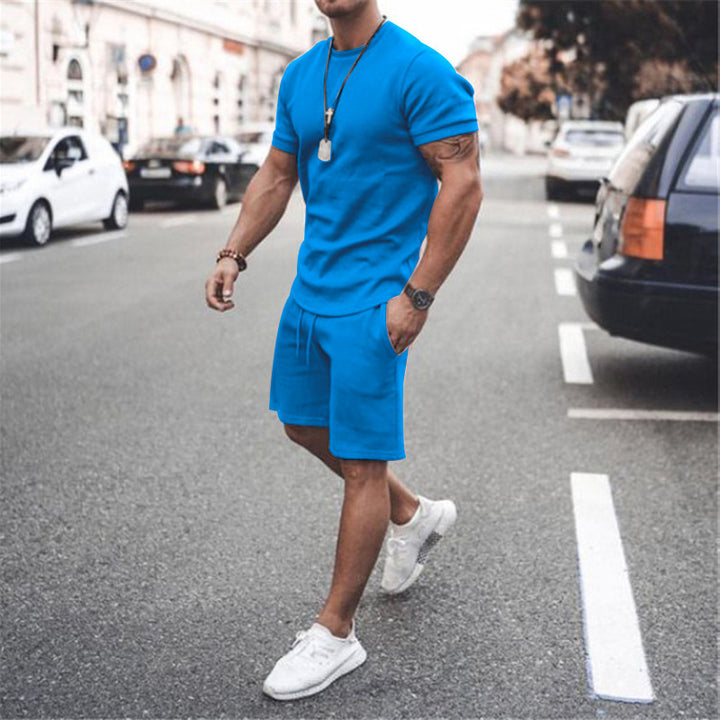 Herren nan figurbetontes Kurzarmshirt mit verstärkter Schulternaht und elastischer Kordelzug-Bermuda aus Stretchjersey Echo Archiv