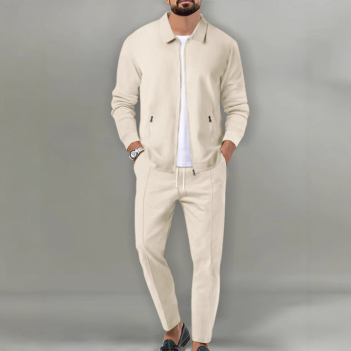 Herren sportliches Set mit strukturierter Jacke und elastischen Jogginghosen Echoarchiv