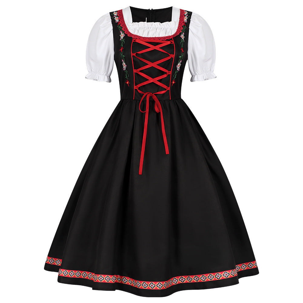 Damen nan traditionelles Dirndlkleid mit besticktem Mieder, Puffärmeln und Schürze Echo Archiv