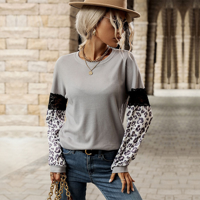 Damen Langarmshirt mit Leopardenärmeln und Spitzenbesatz Echoarchiv