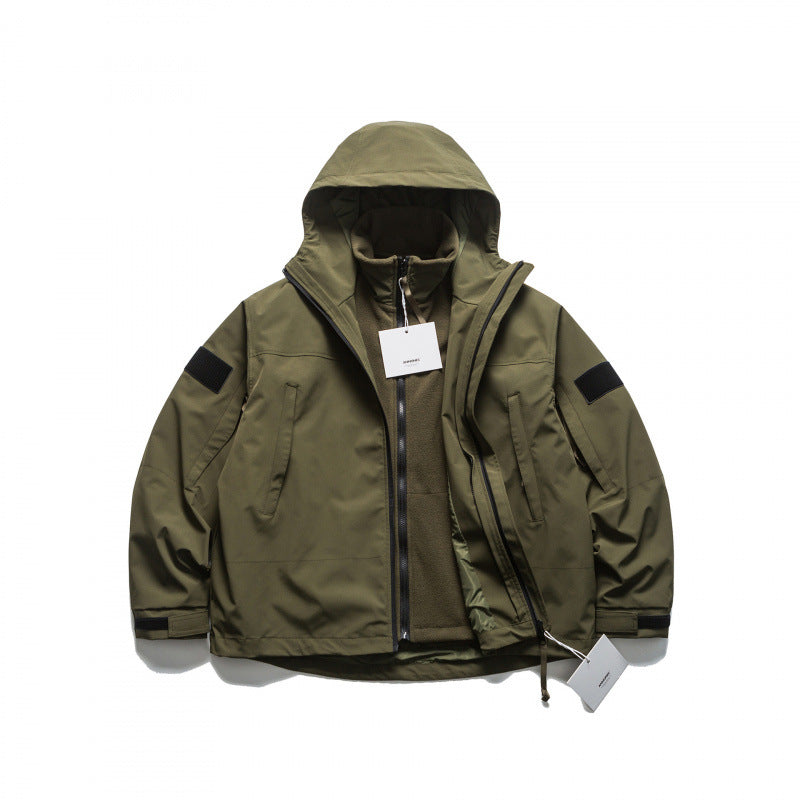 Unisex Oversize-Utility-Regenjacke mit Kapuze und verdecktem Reißverschluss Echo Archiv
