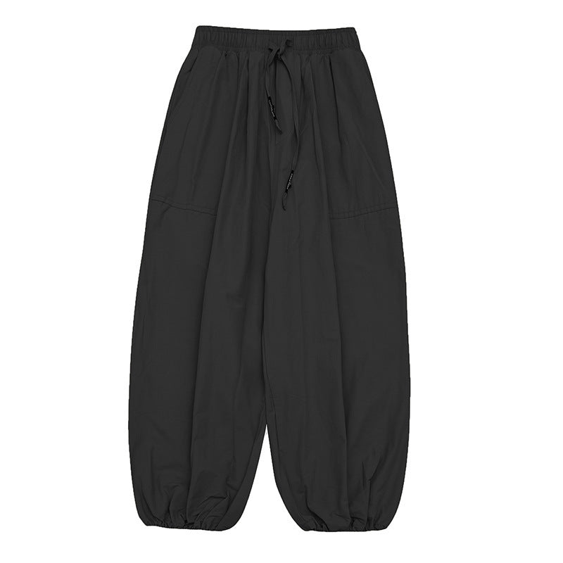 Unisex Weite Harem-Hose mit Kordelzugbund, elastischen Beinabschlüssen und Oversize-Silhouette Echo Archiv