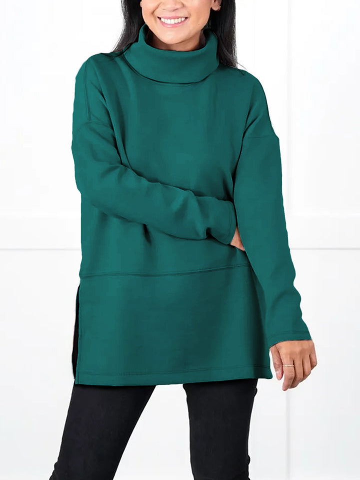 Damen Oversize Sweat-Tunika mit hohem Rollkragen, seitlichen Schlitzen und verlängertem Saum – Avérine