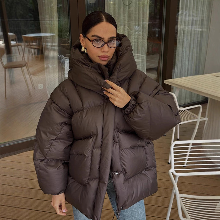 Damen Oversize Steppjacke mit hohem Schalkragen und wattierter Füllung Echoarchiv