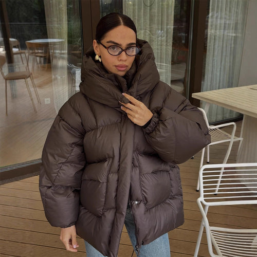 Damen Oversize Steppjacke mit hohem Schalkragen und wattierter Füllung Echoarchiv