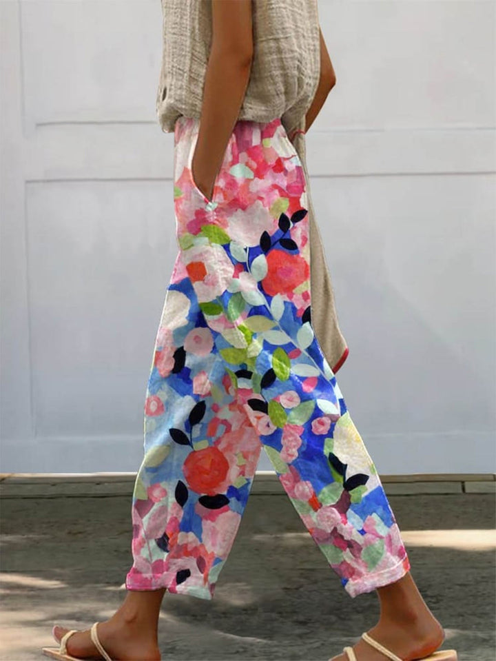 Damen Weite Sommerhose mit floralem Design und praktischen Taschen Echoarchiv