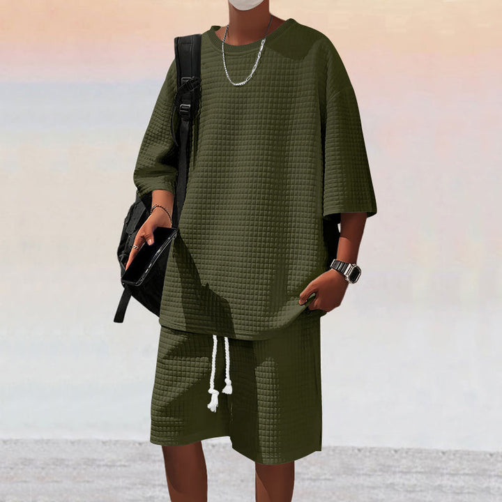 Herren nan quadratstruktur Freizeitset mit oversized Rundhalsshirt und knielangen Relax-Shorts Echo Archiv