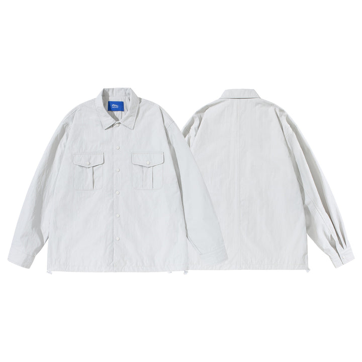 Unisex Oversize-Hemdjacke mit Druckknopfleiste und Pattentaschen Echoarchiv