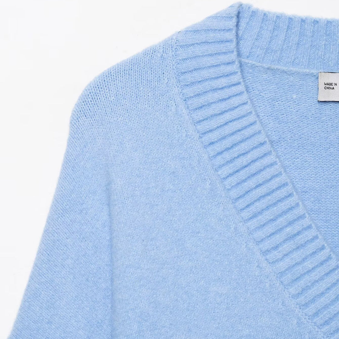 Damen Oversize V-Ausschnitt Pullover mit überschnittenen Schultern und breitem Rippbund Echoarchiv