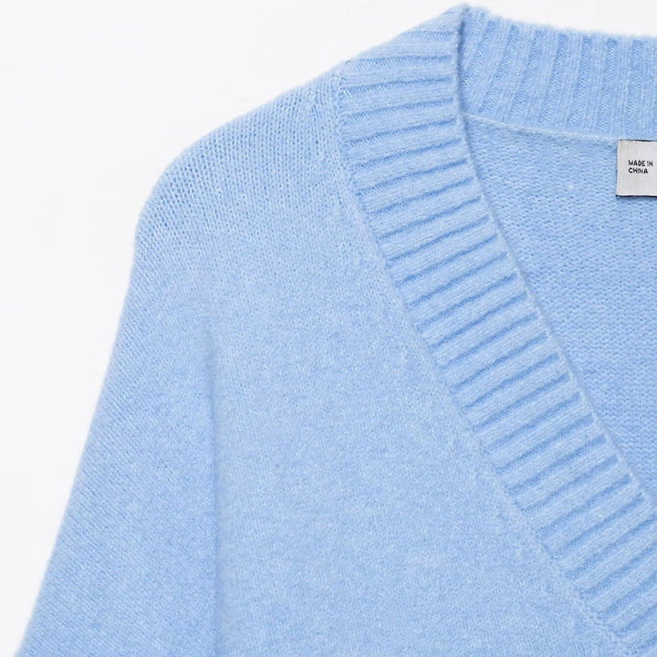 Damen Oversize V-Ausschnitt Pullover mit überschnittenen Schultern und breitem Rippbund Echoarchiv