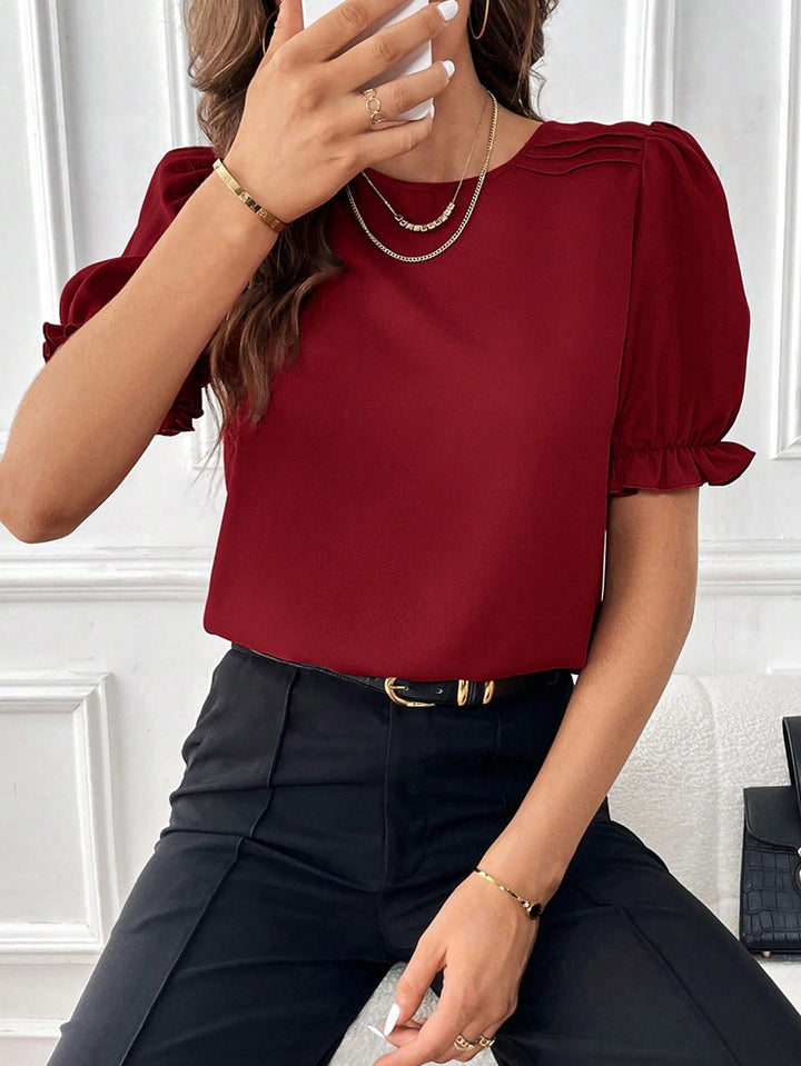 Damen Elegante Chiffonbluse mit Puffärmeln und dekorativen Schulterfalten Echo Archiv