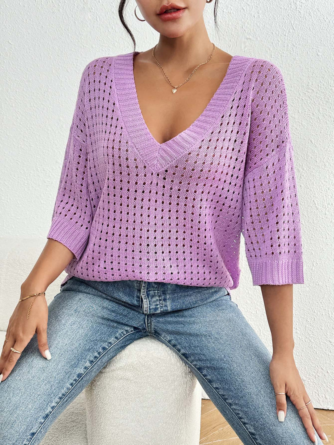 Damen luftiger Strickpullover mit V-Ausschnitt und dekorativem Lochmuster Echo Archiv