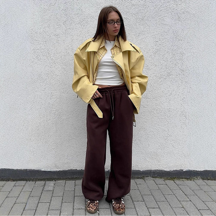 Damen Oversize-Bikerjacke aus veganem Lederimitat mit großem Revers und Taillengürtel Echoarchiv