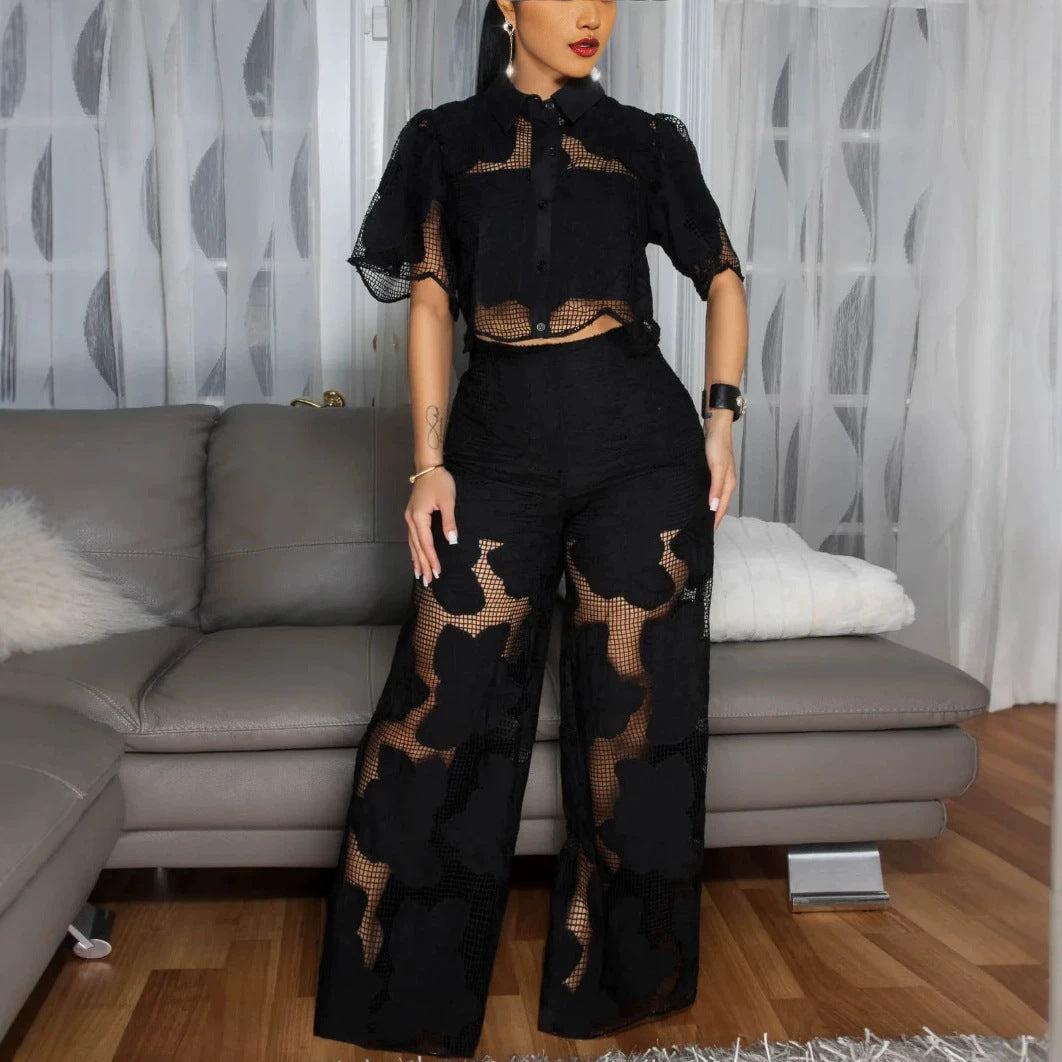 Damen nan kurzgeschnittene Hemdbluse aus floraler Netzspitze mit hochgeschnittener Weitbein-Hose Echo Archiv