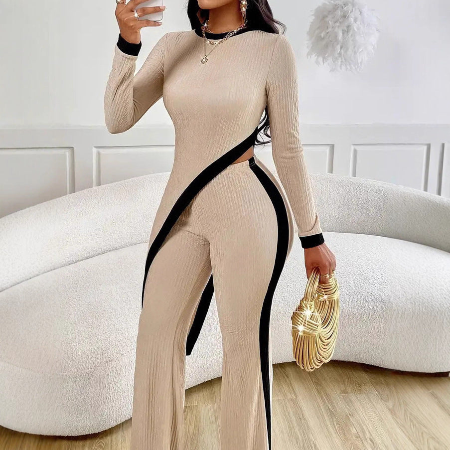 Damen nan eleganter Rippen-Jumpsuit mit asymmetrischer Wickeloptik, taillierendem Cut-Out und kontrastierenden Seitenstreifen Echo Archiv