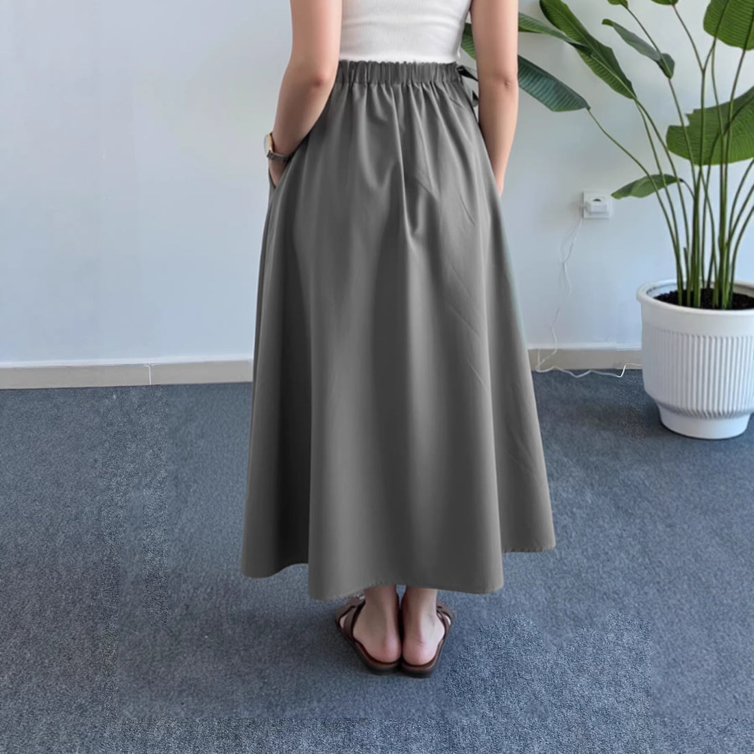 Damen Fließender Midirock mit hohem Smokbund, Bindeschleifen und Eingrifftaschen – Avérine