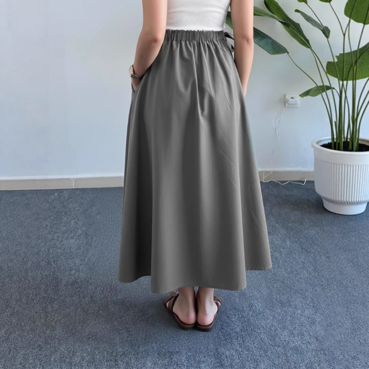 Damen Fließender Midirock mit hohem Smokbund, Bindeschleifen und Eingrifftaschen – Avérine