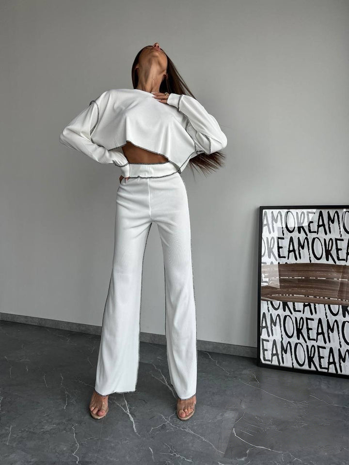 Damen Cropped Oversized-Sweatshirt mit Overlocknähten und High-Waist ausgestellter Hose Set – Avérine