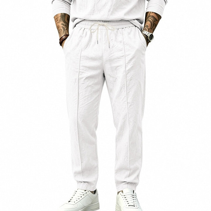 Herren Tapered-Freizeithose mit Tunnelzug, Bügelfalte und elastischem Saum Echoarchiv