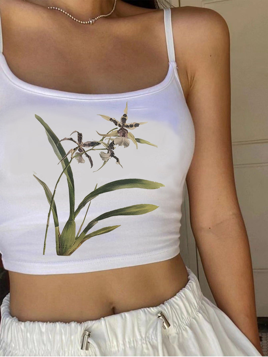 Damen Crop-Top mit floralem Design und schmalen Trägern Echo Archiv