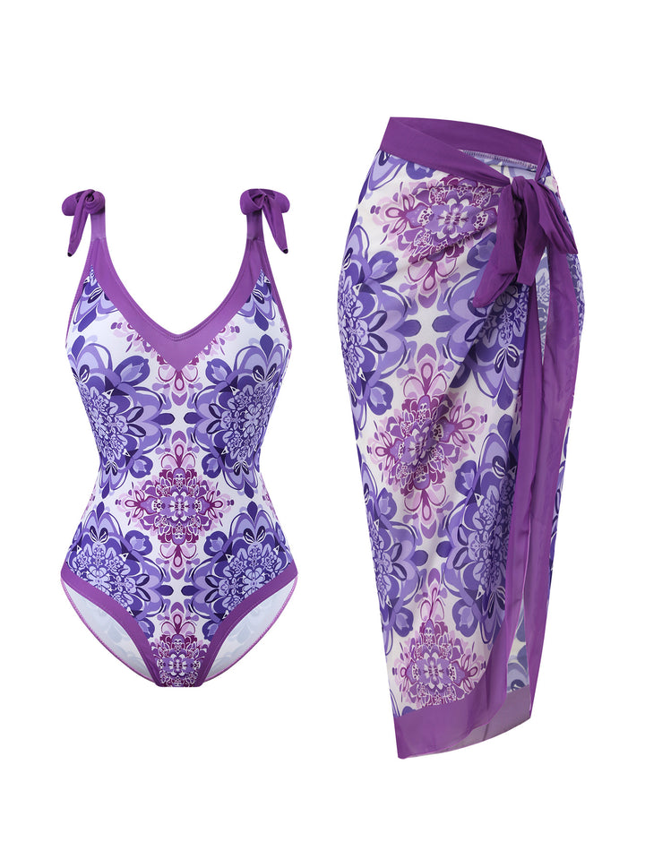 Damen Badeanzug mit floralem Design und transparentem Wickelrock Echo Archiv