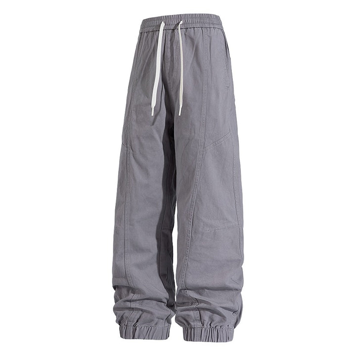 Herren Oversized Utility-Jogginghose aus robustem Baumwollmix mit Kordelbund, seitlichen Cargo‑Taschen & gerippten Bündchen Echoarchiv