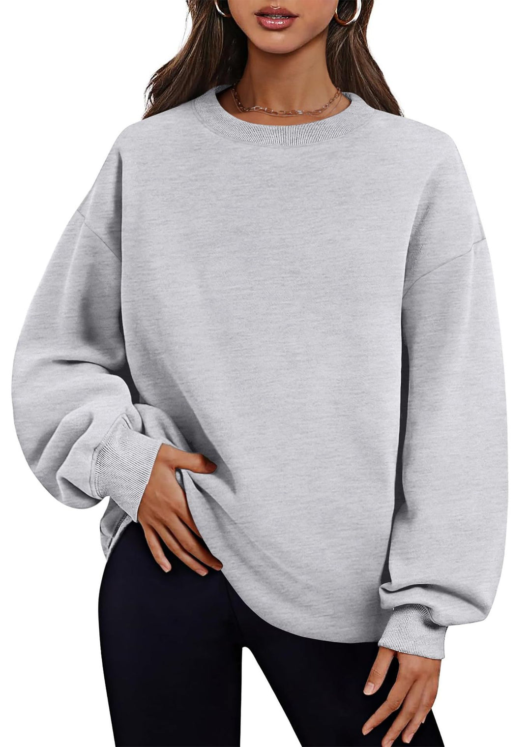 Damen verlängertes Oversize Rundhalspullover mit seitlichen Eingrifftaschen, Rippbündchen und überschnittener Schulter – Mavelle