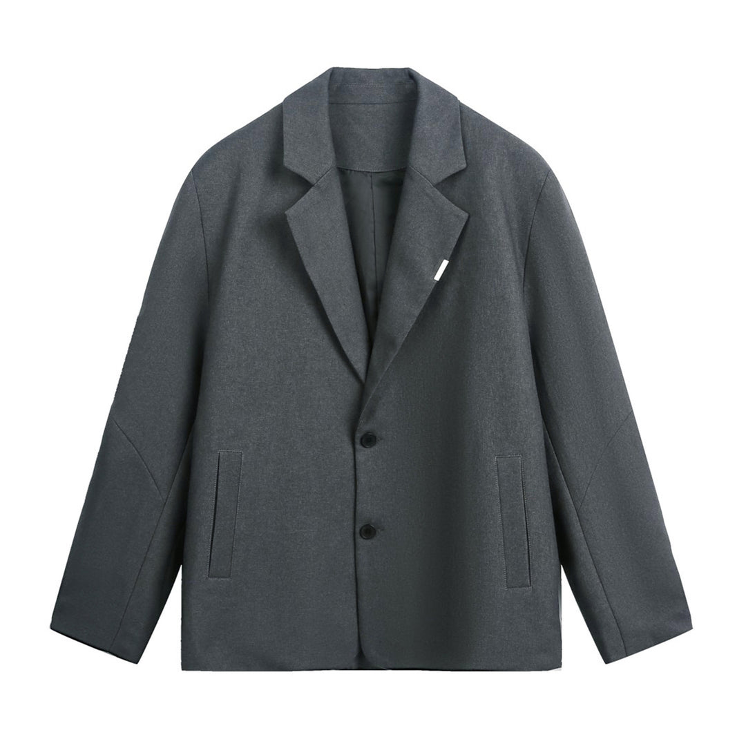 Unisex Boxy-Sakko im Oversize-Schnitt mit Reverskragen und dezentem Knopfverschluss Echo Archiv