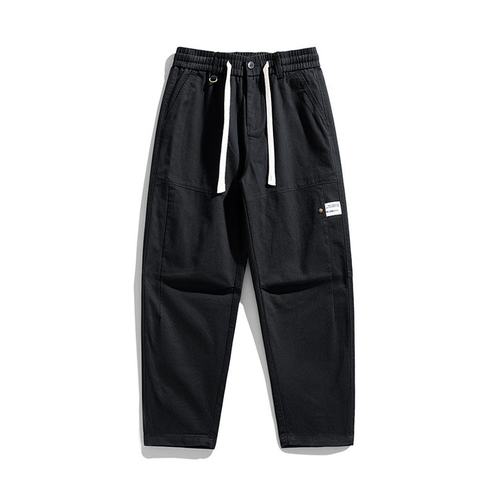 Herren Locker geschnittene Cargo-Jogginghose mit Tunnelzug, Knieabnähern und Utility‑Details Echo Archiv