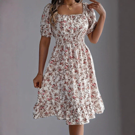 Damen sommerliches Blumenkleid mit Puffärmeln und Rüschensaum Echo Archiv