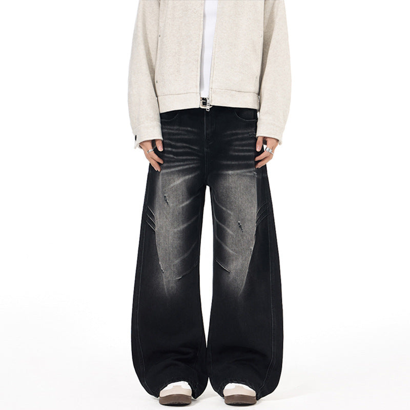 Herren Ultraweite Denim-Palazzohose mit skulpturalen Seitenbahnen und Used‑Effekt Echo Archiv