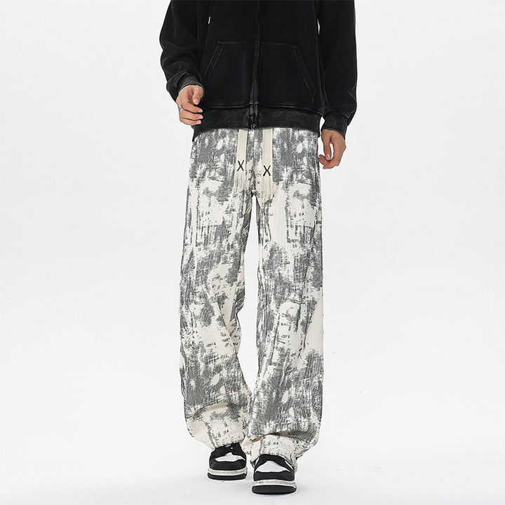Herren Weit geschnittene Loungehose mit abstraktem Allover‑Print, elastischem Bund und Tunnelzug Echo Archiv