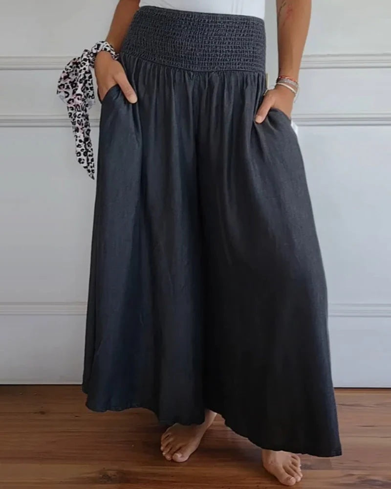Damen-Maxi-Rock mit hohem Smockbund, weitem Fall und seitlichen Taschen – Valéora