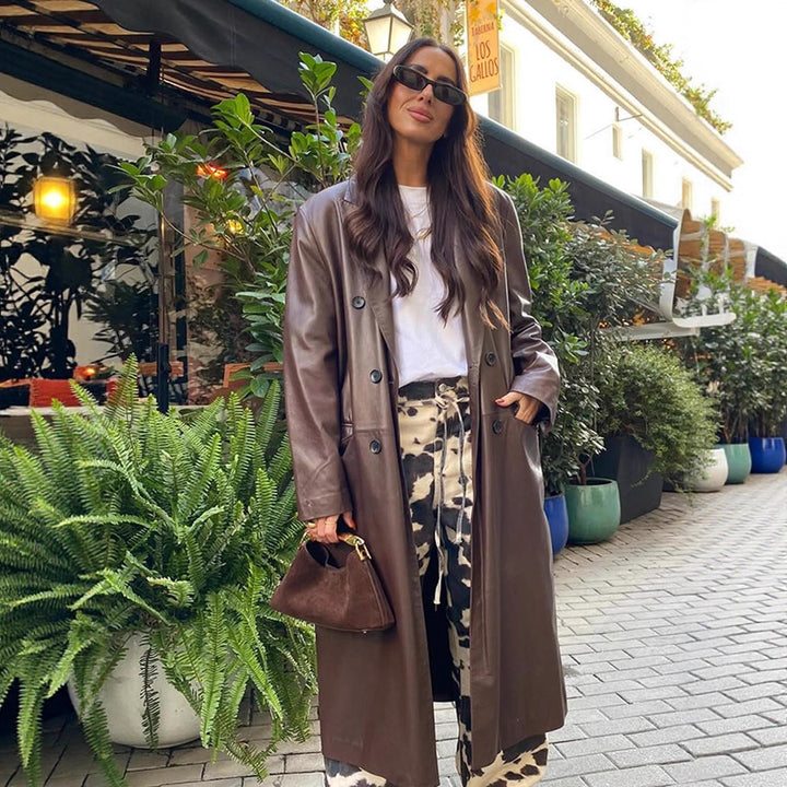Damen langer Lederimitatmantel mit doppelreihiger Knopfleiste und Oversize-Schnitt Echoarchiv