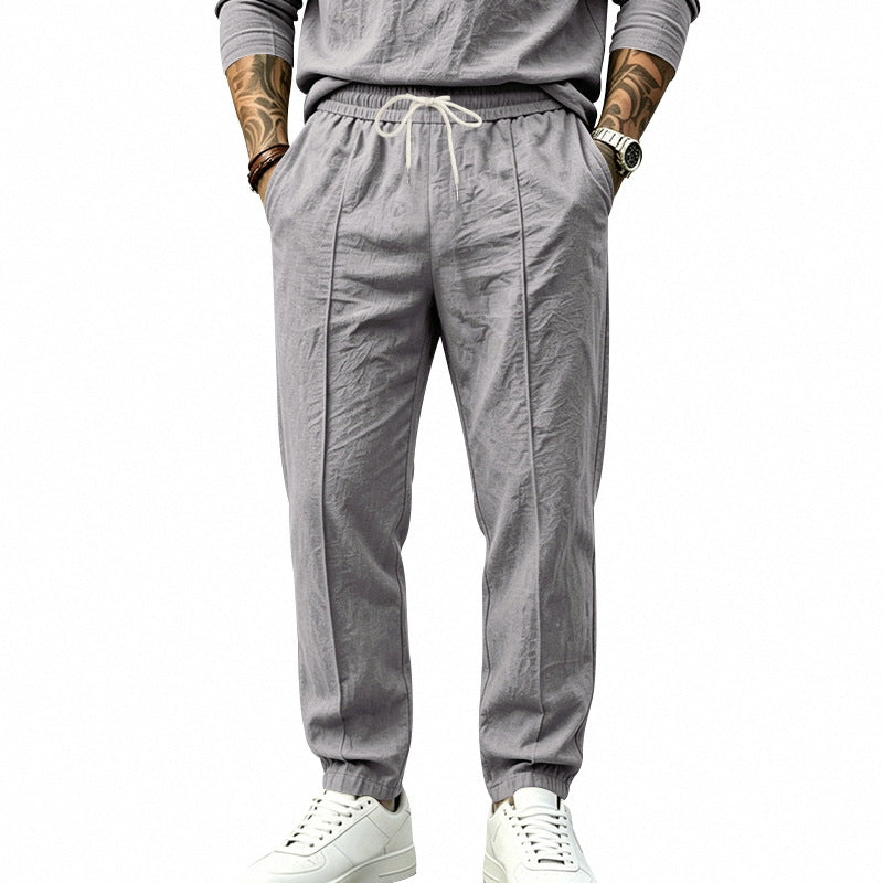 Herren Leichte Tapered-Jogginghose mit Bundfalten, elastischem Tunnelzug und Seitentaschen Echoarchiv