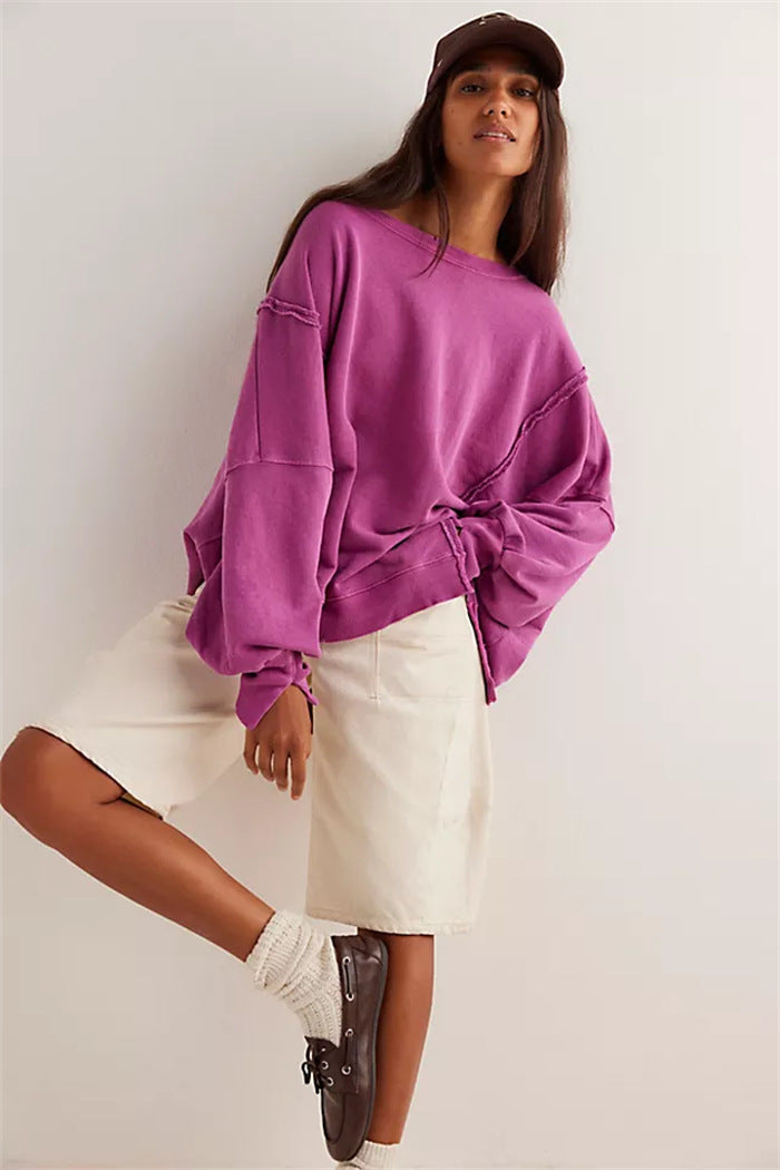 Damen oversized Sweatshirt mit Ballonärmeln, offenen Saumnähten und seitlichen Schlitzen – Avérine