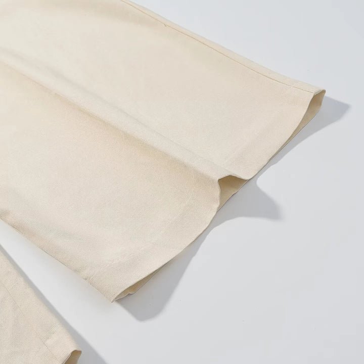 Damen hochtaillierte Palazzo-Hose mit Bundfalten, weitem Bein und verdeckter Frontleiste – Avélisse