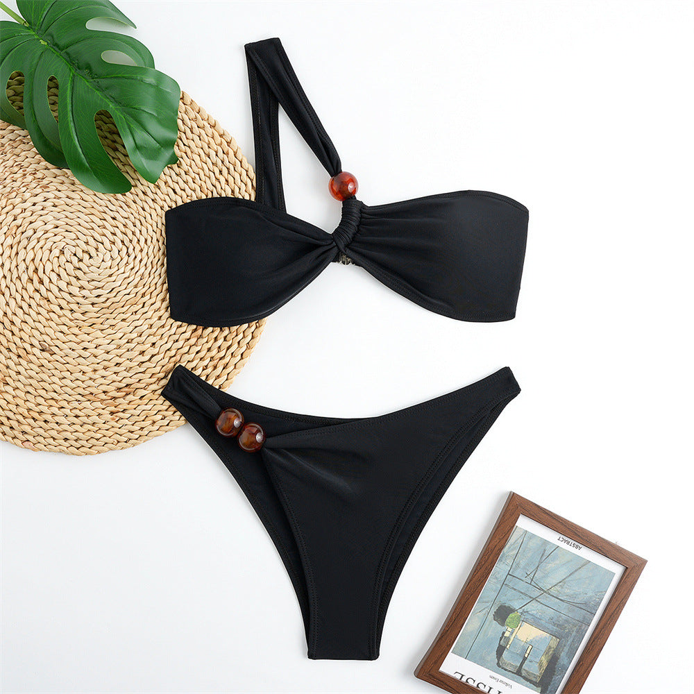Damen Bikini-Set mit asymmetrischem Halter-Neck und dekorativen Hosenknöpfen Echo Archiv