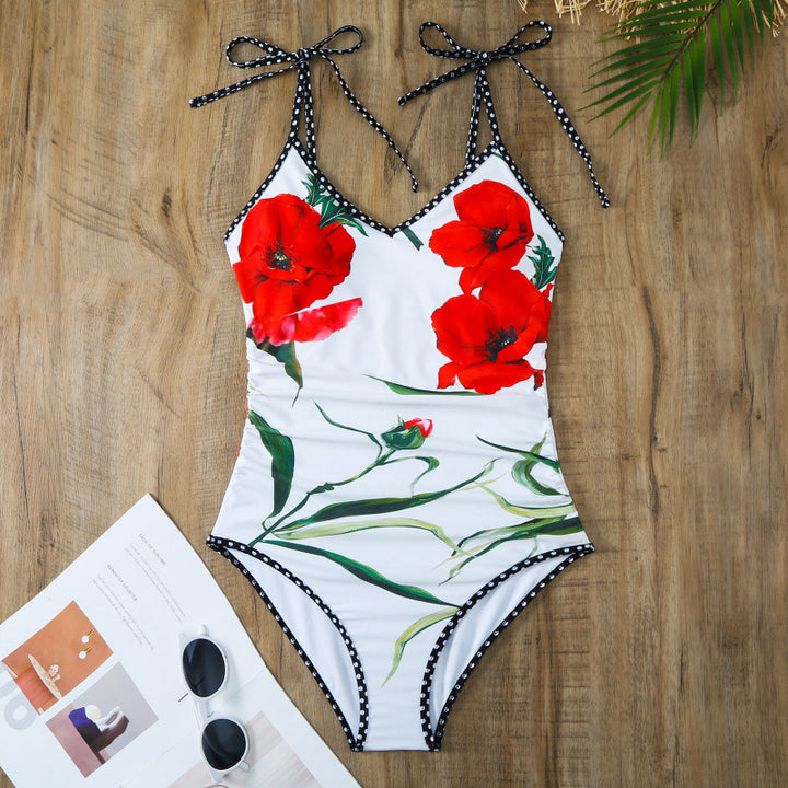 Damen Einteiler Badeanzug mit floralen Akzenten und passendem Wickelrock Echo Archiv