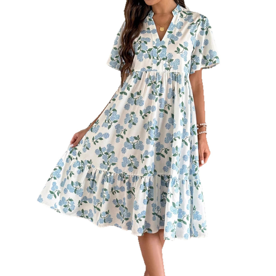Damen Midikleid mit frischem Blumenmuster und voluminösem Rock Echo Archiv