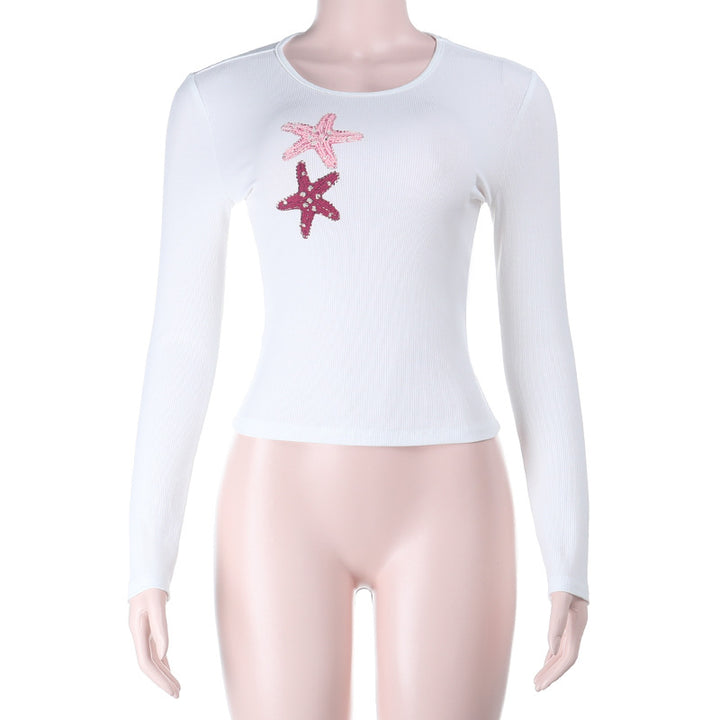 Damen Tailliertes Rippen-Longsleeve-Crop-Top mit Pailletten-Seestern-Applikation – Avérine